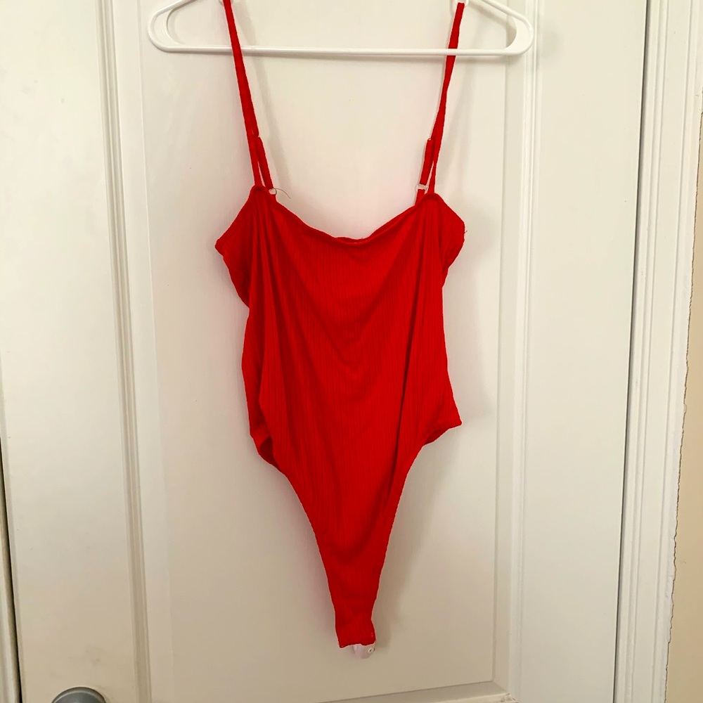 Red body suit
